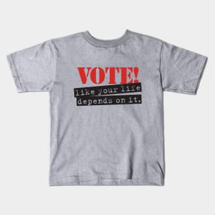 Vote like your life depends on it. Kids T-Shirt